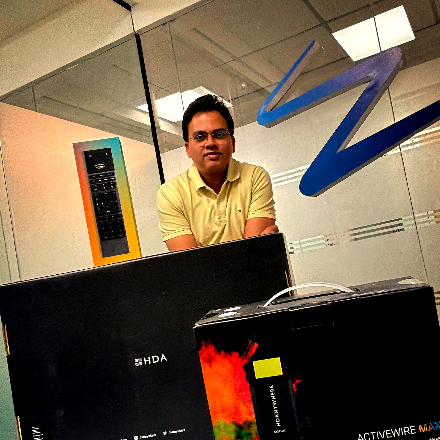 Pulkit Mathur of Escala Tech, India posing with MHUB and uControl Remote